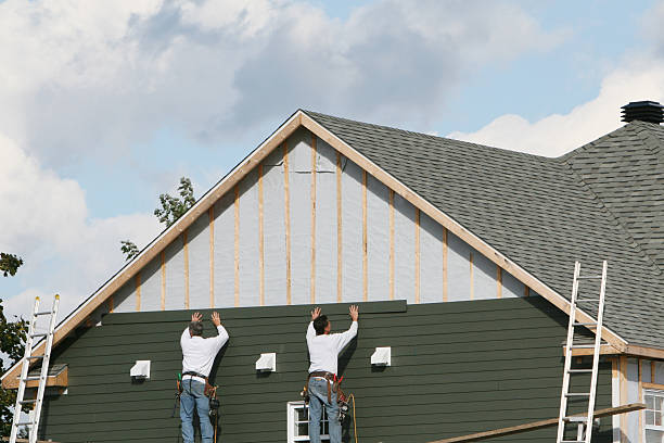 Professional Siding technician working in Petersburg, VA